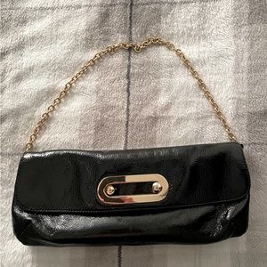 Hobo international leather black & gold clutch purse